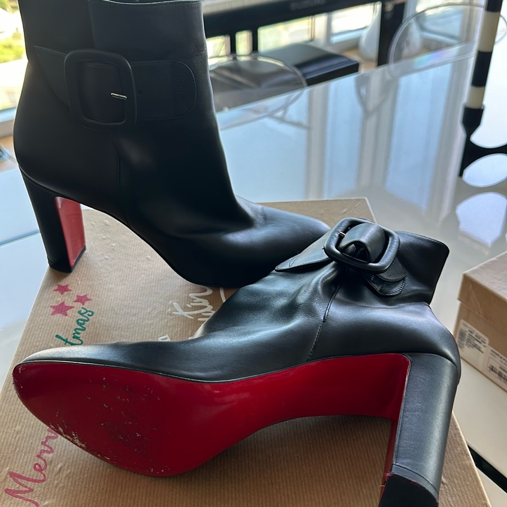 Christian bouton boots about 3 inch heel